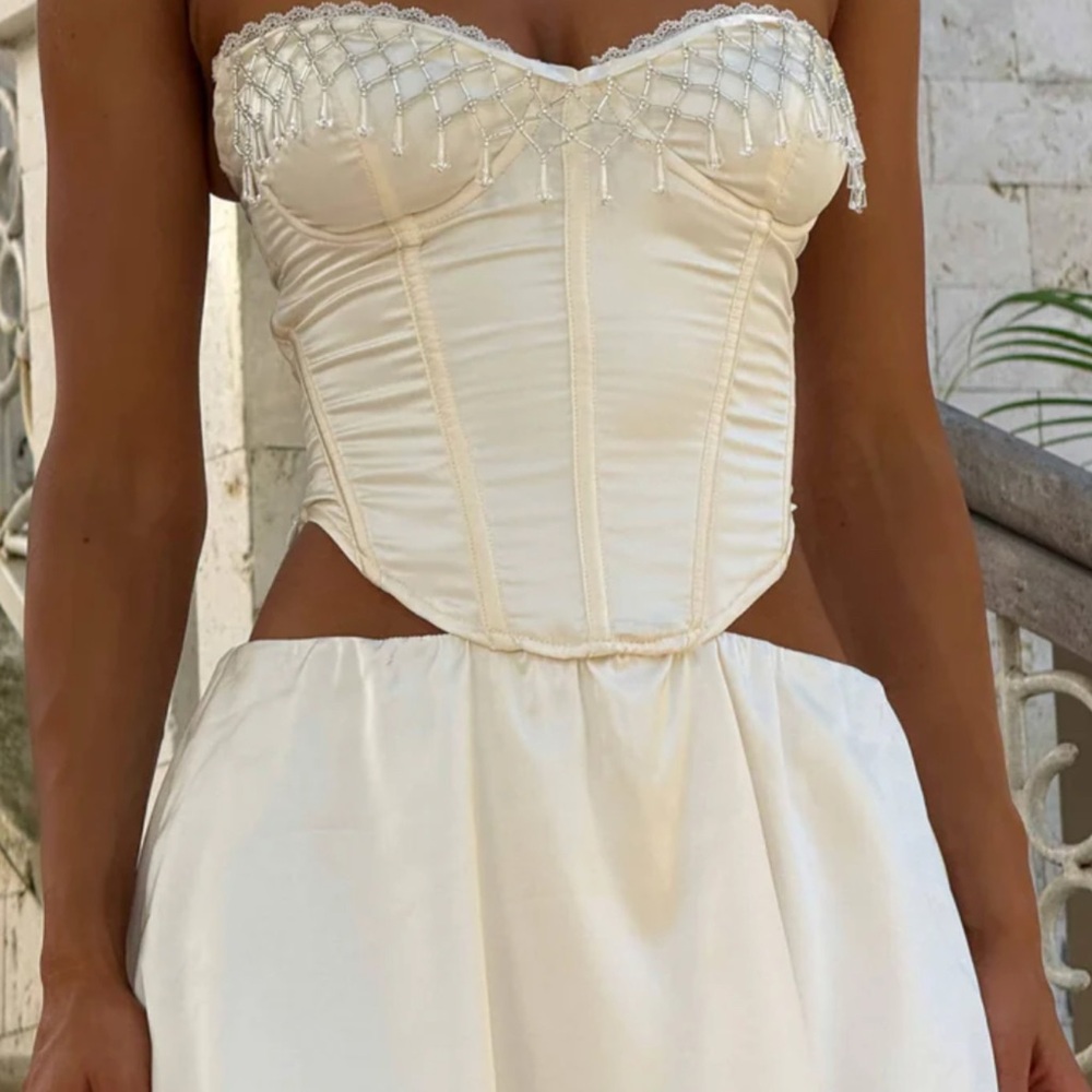 Chic Strapless Cream Dress from Outcast